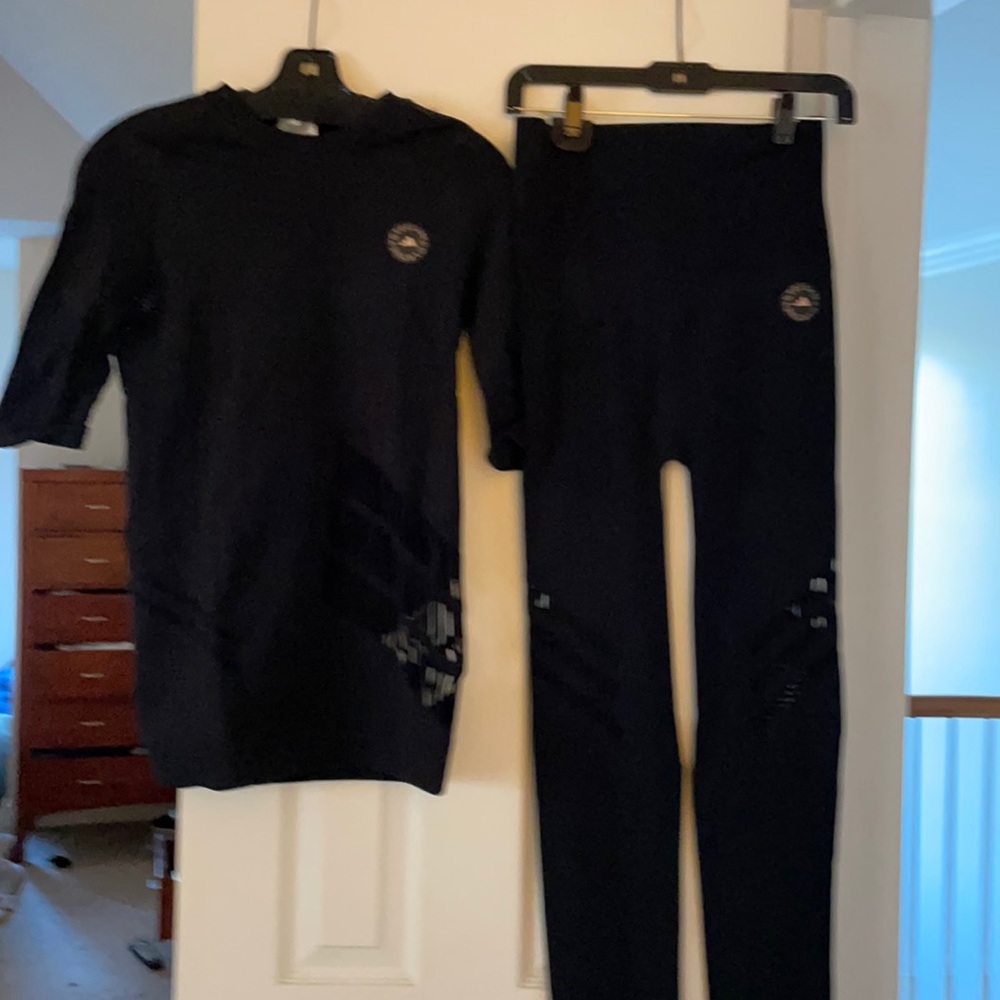 Stella McCartney leggings and top by Adidas tags still on
